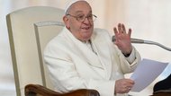Pope preaching from his chair; side view from his right