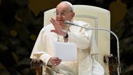 Pope preaching from his chair and waving to the crowds