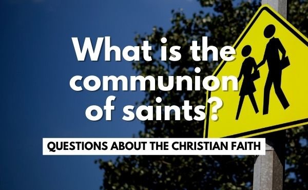 "What is the communion of saints?" over crosswalk sign