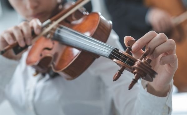 Tuning a violin